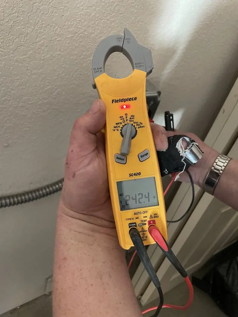 Voltage testing with clamp meter during Generator Installation in North Richmond